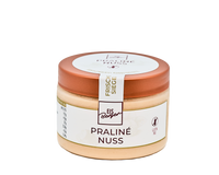 Ein kleines Glas Hofmanns Shop Premium-Eis Praline-Nuss mit Nussgeschmack und einem kupferfarbenen Deckel.