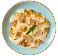 Bratapfeldessert von Hofmanns Shop mit Vanille-Quarkcreme, Obst, Waffelstücken & Minze serviert.