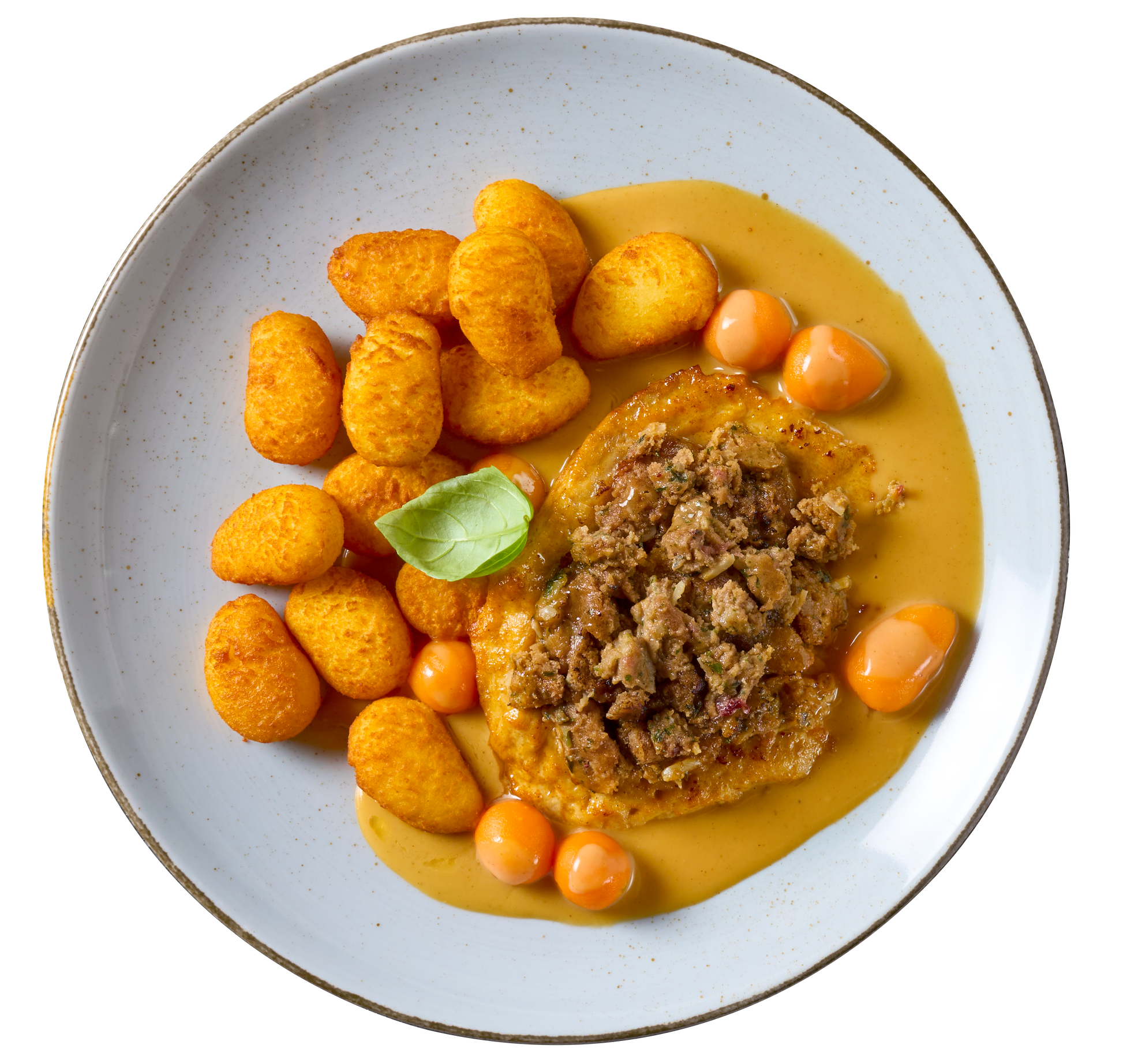 Ein Tellergericht mit Schweinesteak "Spekulatius" von Hofmanns Shop, Dauphine-Kartoffeln, Kichererbsen, Beilage.