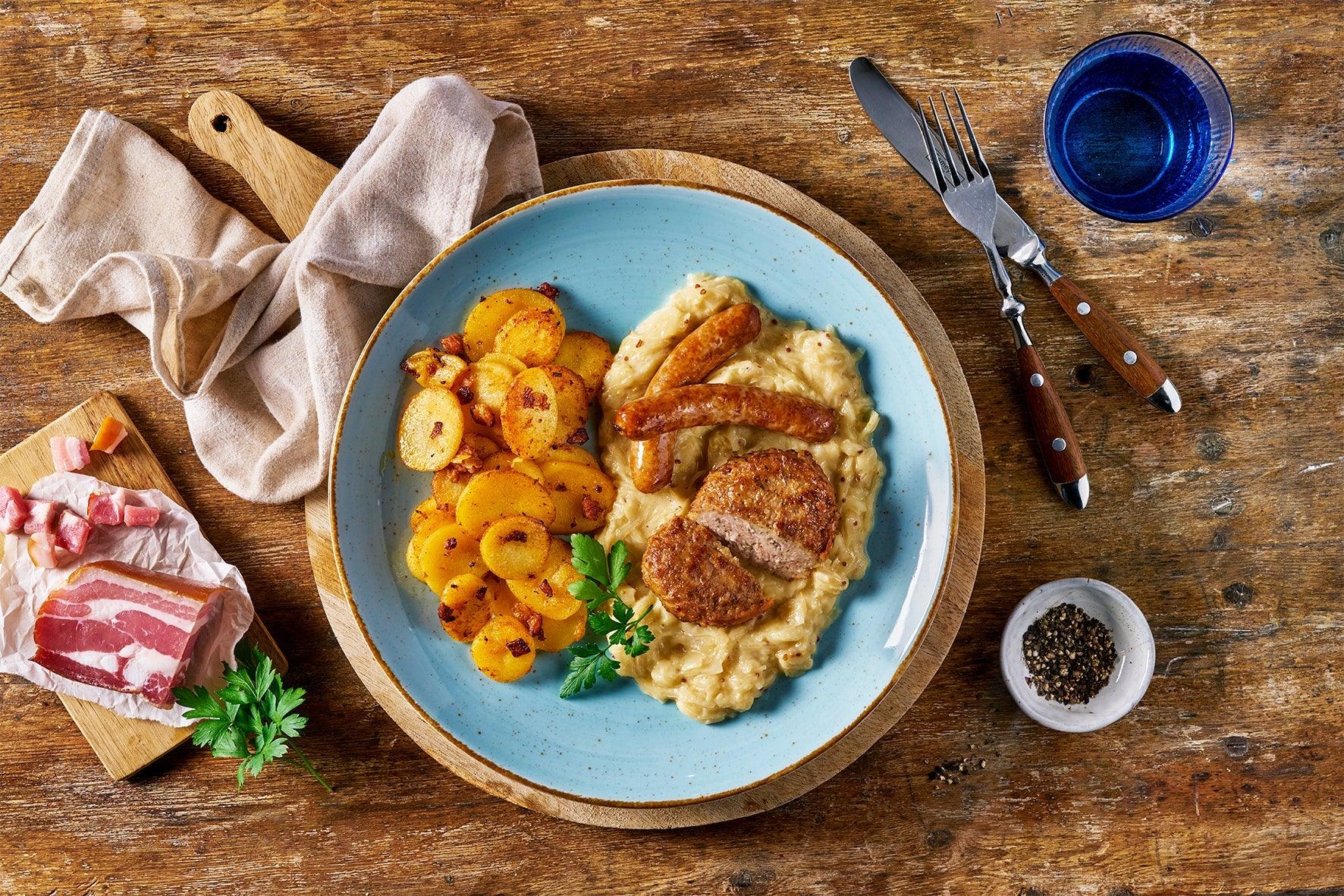 Überraschungsbox von HOFMANNs: wie im Restaurant genießen – mit Kartoffeln, Fleisch & cremiger Sauce.