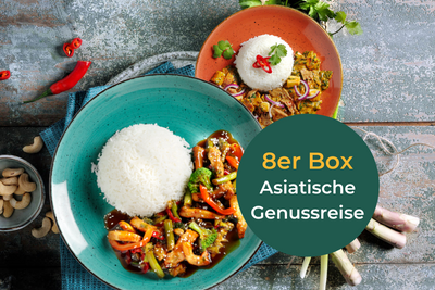 Zwei Schüsseln asiatischer Gerichte mit Reis, Gemüse und Fleisch, darunter Chicken Curry. 8er Box HOFMANNs Asiatische Genussreise.