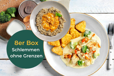 Ein Teller Schlemmen ohne Grenzen von HOFMANNs – Hühnchen, Gemüse, Getreide und Wedges; Deutscher Text.