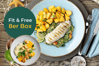 Gegrillter Fisch mit Kartoffeln und Gemüse, HOFMANNs Fit & Free-Box Promo auf einem grünen Kreis. Eiweißreich!.