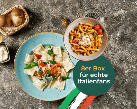 Zwei Teller italienische Pasta mit Brot & Käse – HOFMANNs Italien-Box für echten Genuss.