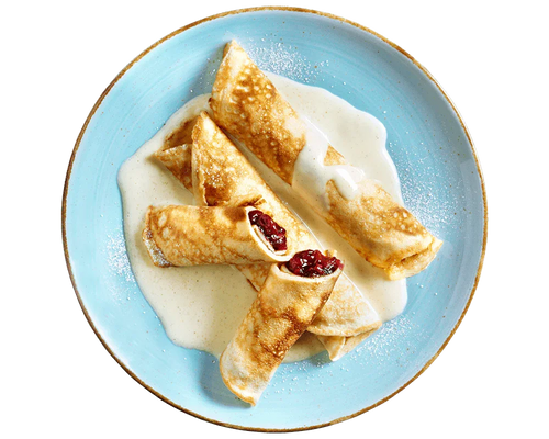 Drei HOFMANN-Kirschpfannkuchen mit Sahnesauce auf einem blauen Teller, bestäubt mit Puderzucker.