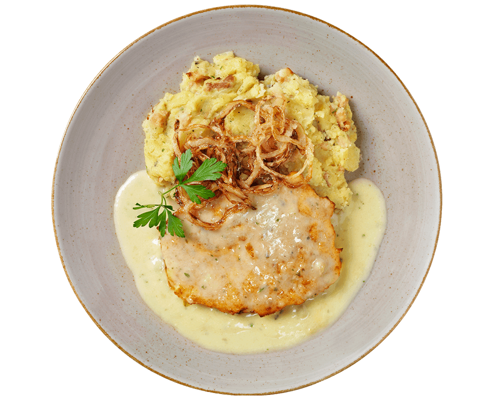 Hofmanns Shop Röstzwiebel-Schnitzel mit Kartoffelpüree, Champignon-Sahnesauce und Petersilie.