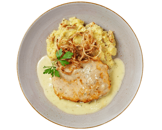Hofmanns Shop Röstzwiebel-Schnitzel mit Kartoffelpüree, Champignon-Sahnesauce und Petersilie.